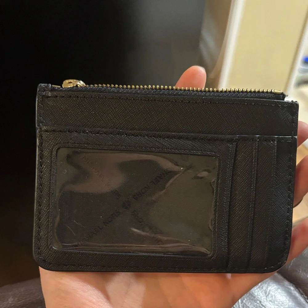 Michael Kors Black Pouch with Gold Accents